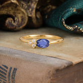 0.5ct Oval Cut Tanzanite Ring with Side Stones for Her